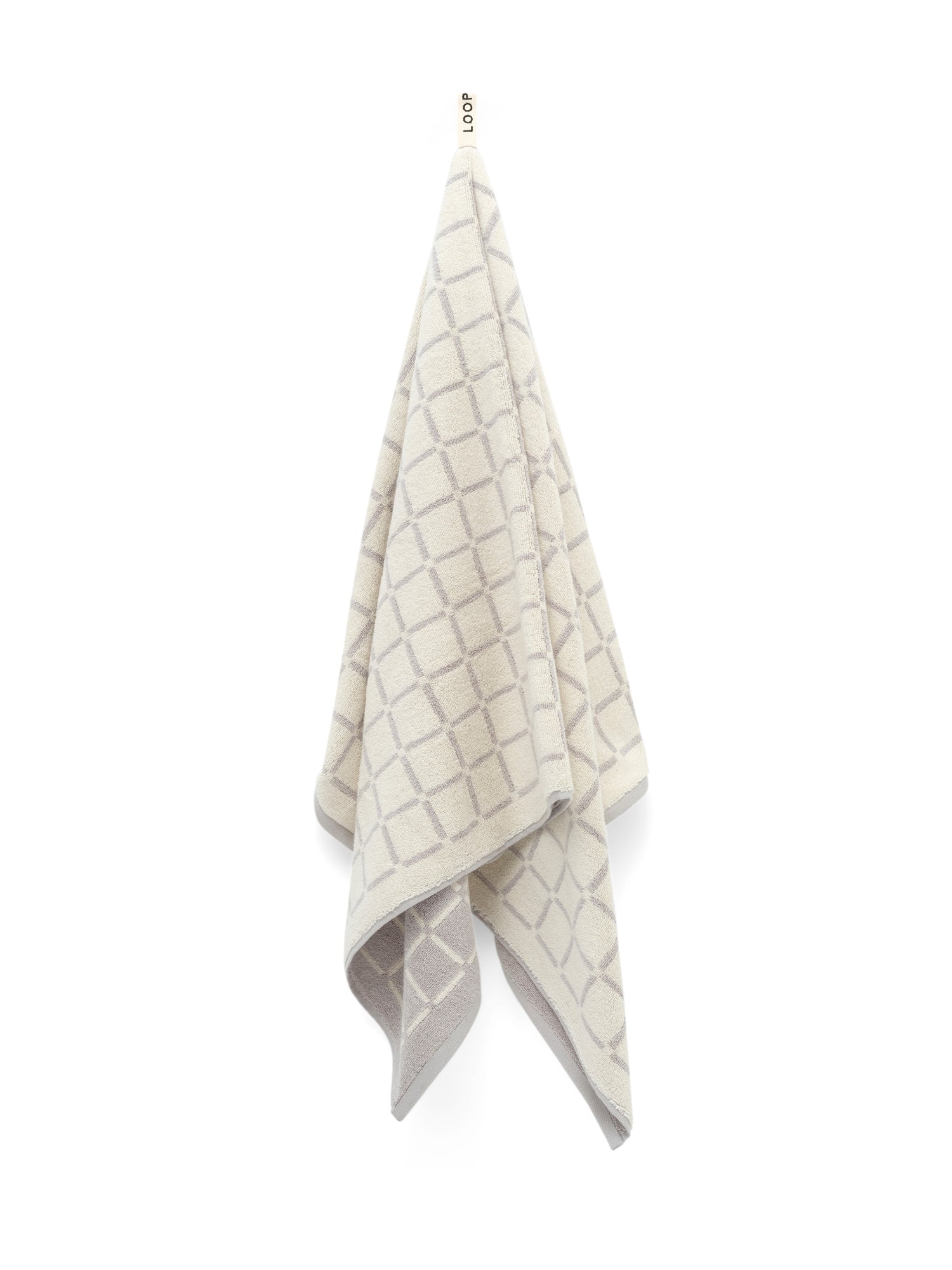 LOOP HOME butter and stone bath towel with grid pattern