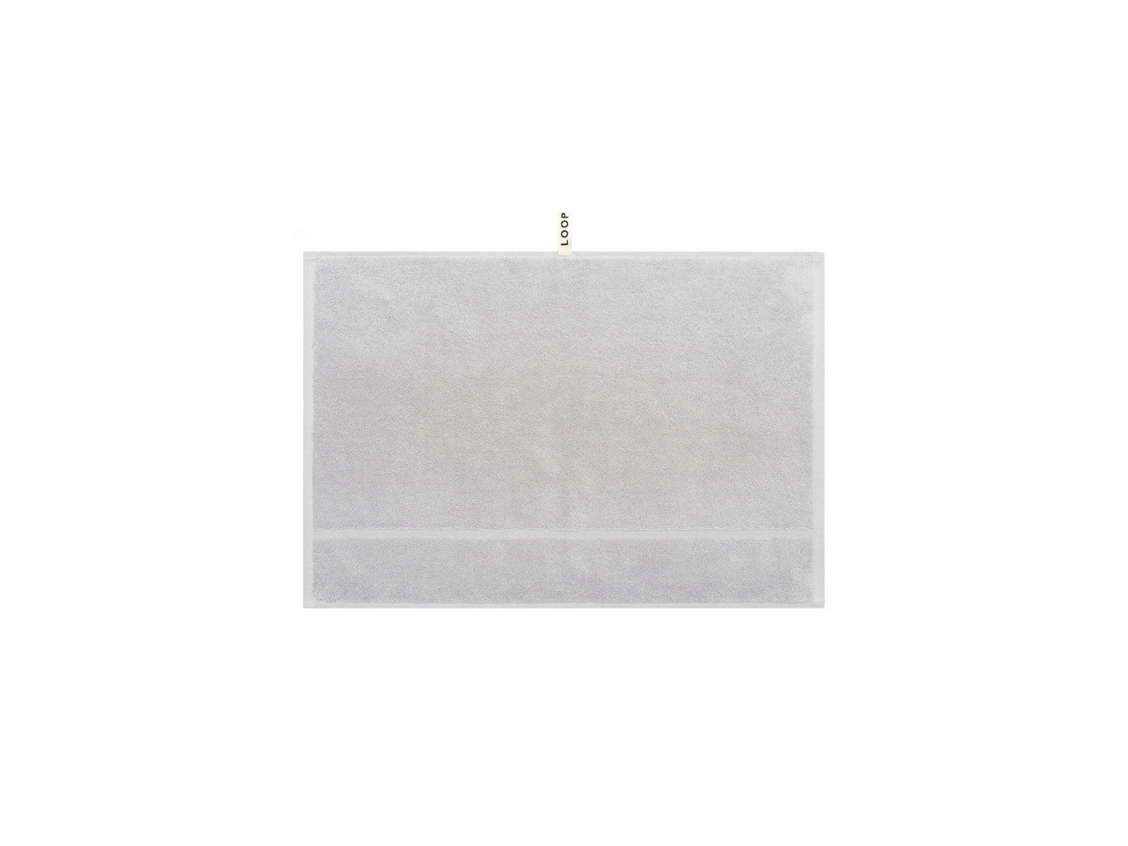 LOOP HOME stone hand towel folded showing bold stripe pattern