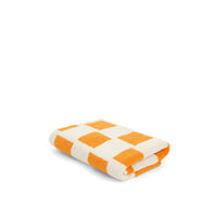 LOOP HOME saffron and ivory hand towel showing offset pattern