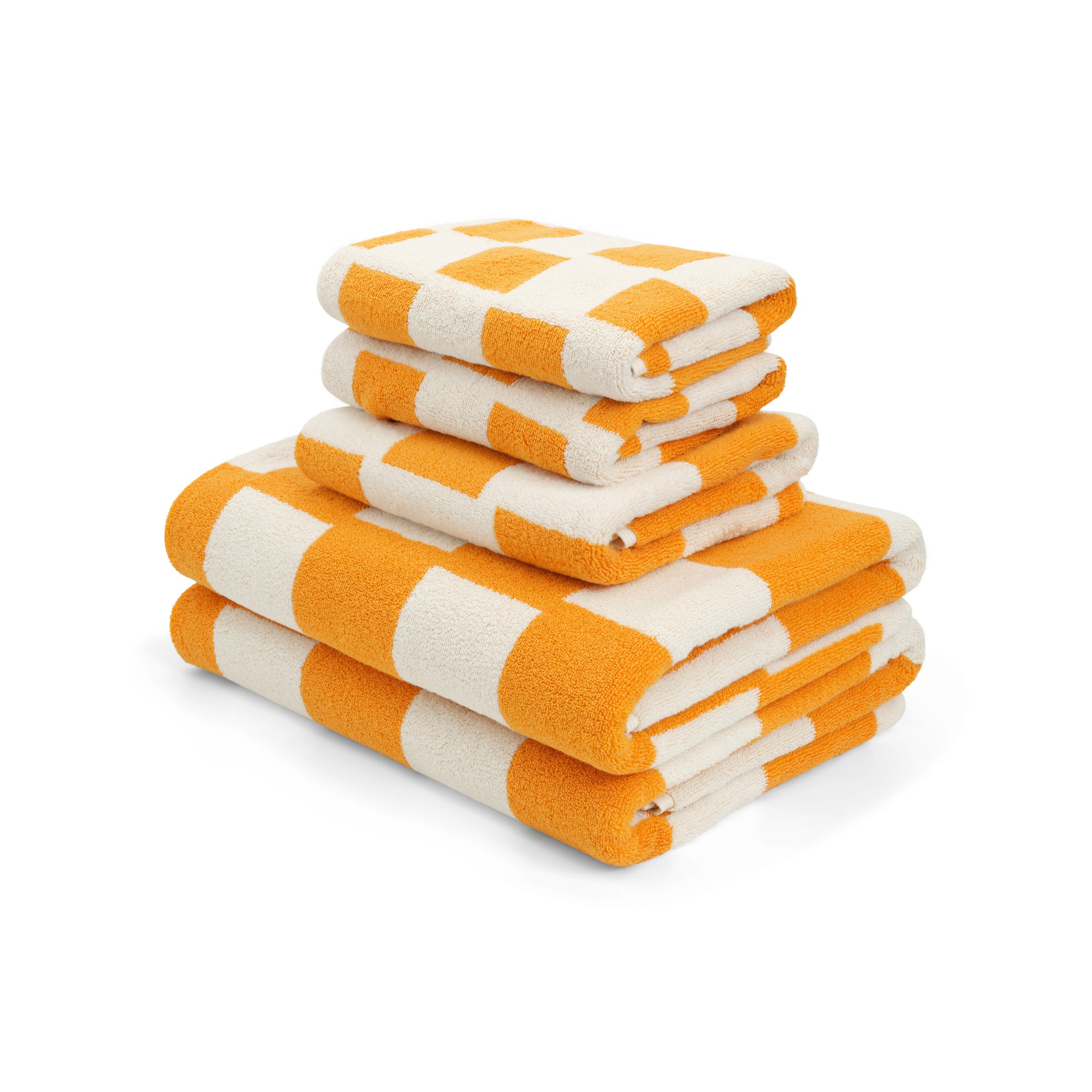 Stacked LOOP HOME organic cotton towel bundle in terracotta and stone colourway